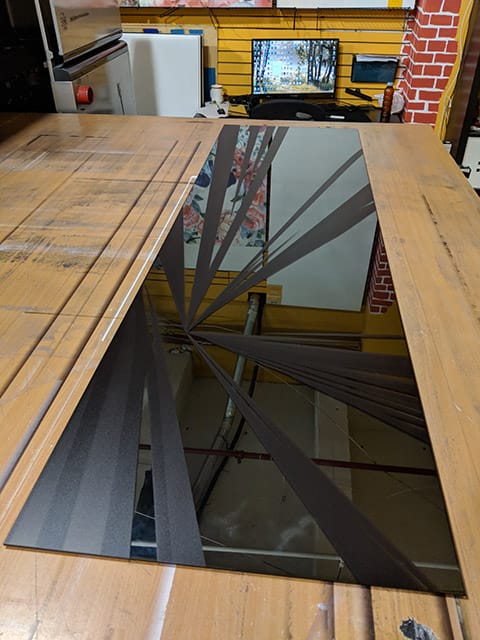 UV-printing on a grey mirror